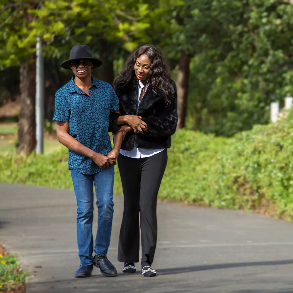 Jinga's founder walking beside one of her participants